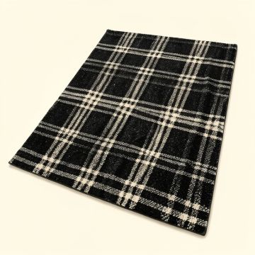 Wiest Plaid Black/Cream Indoor/Outdoor Area Rug (synthetic illustration; no displayed measurements)