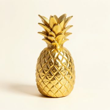 Golden Pineapple Snow Globe (synthetic illustration; no displayed measurements)