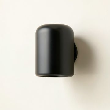 Reed Bluff Wall Sconce Mounted On A Plain Wall - Black (synthetic illustration; no displayed measurements)