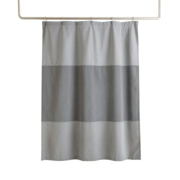 Dawn Crossing Shower Curtain Hanging Flat From A Plain Rod - Gray