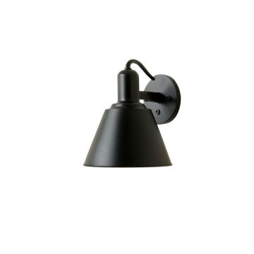 Alder Arc Wall Sconce Mounted On A Plain Wall