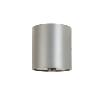 Vale Crossing Wall Sconce Mounted On A Plain Wall - Gray
